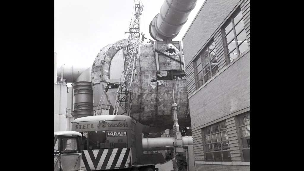 Crane removes tunnel outer shell and insulation