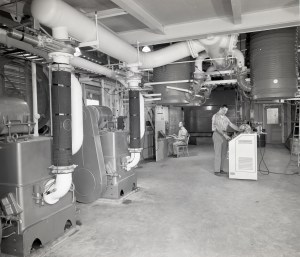 Men working inside Vacuum Pump House
