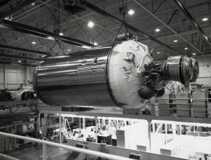 Centaur lifted horizontally by crane in factory