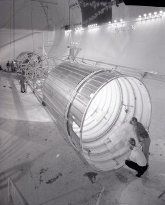 Engineers examine tubular Atlas-Centaur setup inside SPC No. 2