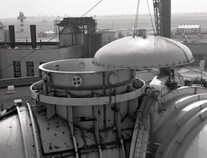 Crane lifts cap off the top of SPC No. 1 dome