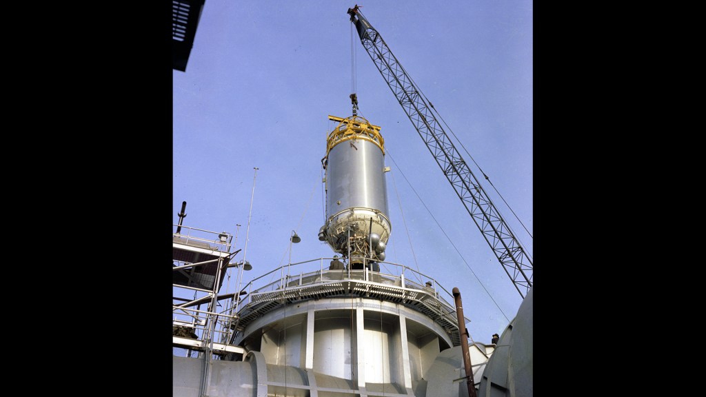Crane lowers Centaur into test chamber
