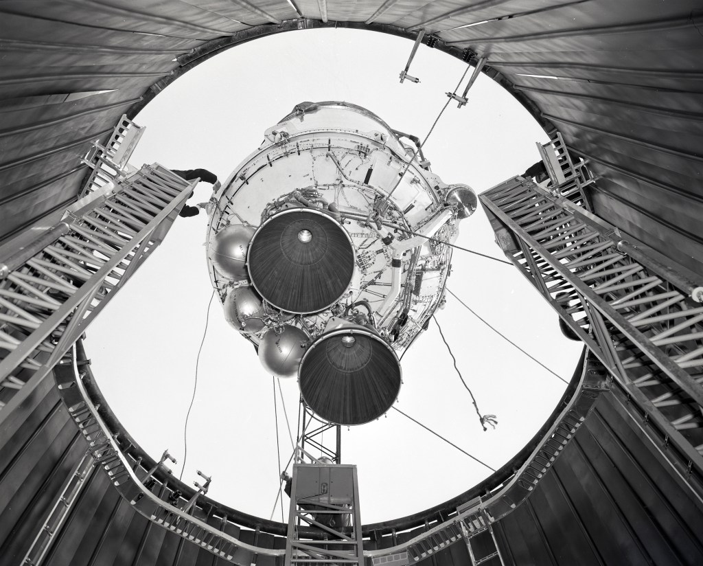 A 100 foot crane is used to lower a Centaur 6A into the SPC No. 1.