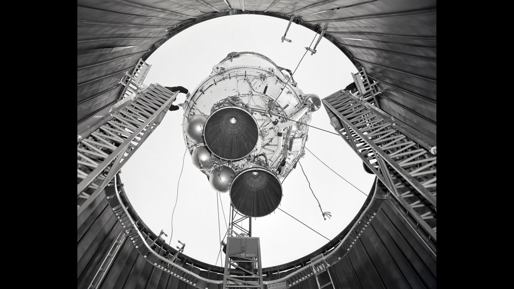 A 100 foot crane is used to lower a Centaur 6A into the SPC No. 1.