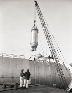Crane lowering a Centaur rocket into the Space Power Chamber No.1