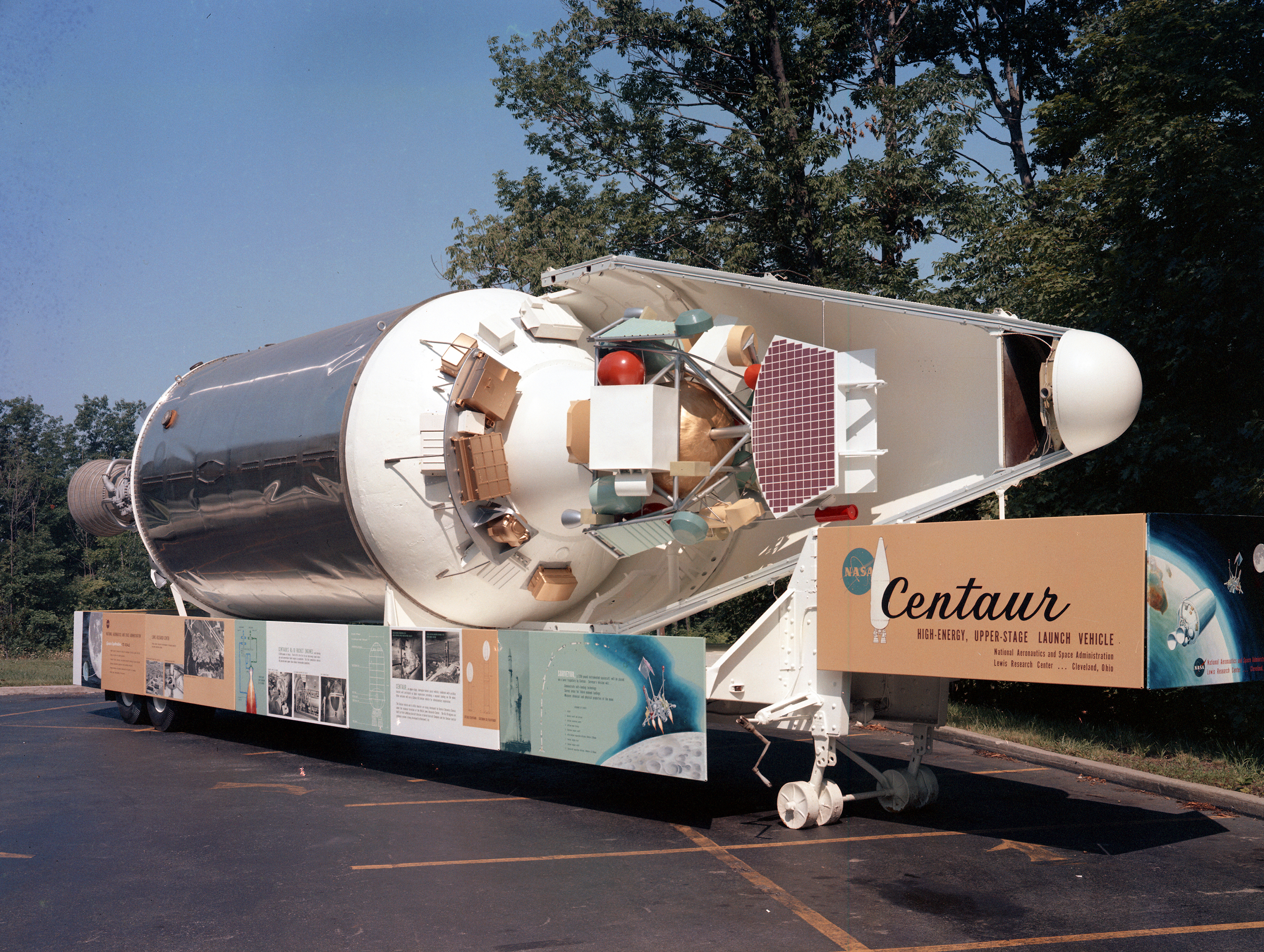 Lifesize model of Centaur rocket with payload visible