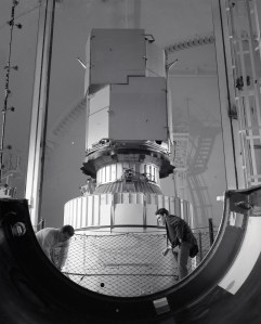 Lewis researchers examine the base of the OAO-2 nose fairing after it was jettisoned in SPC No. 2