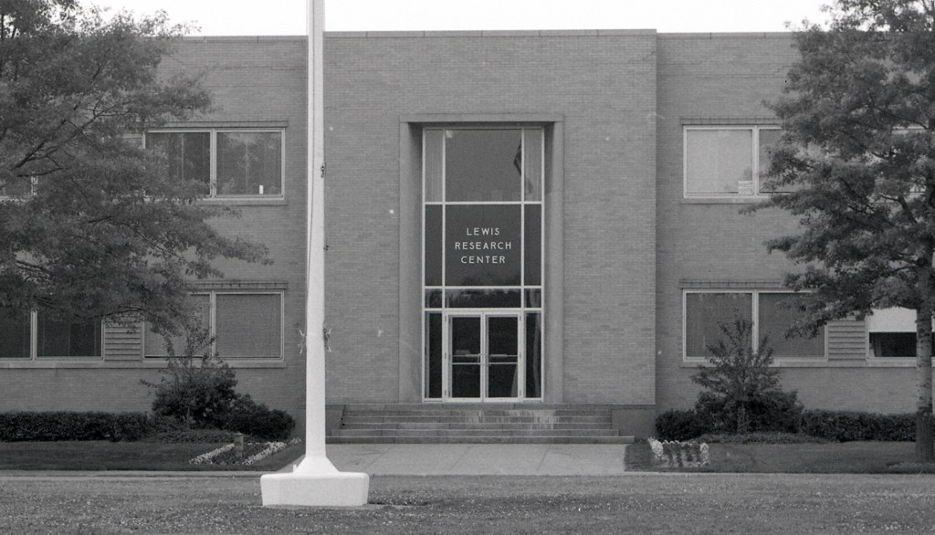 View of main entrance to brick building.