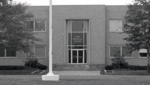 View of main entrance to brick building.