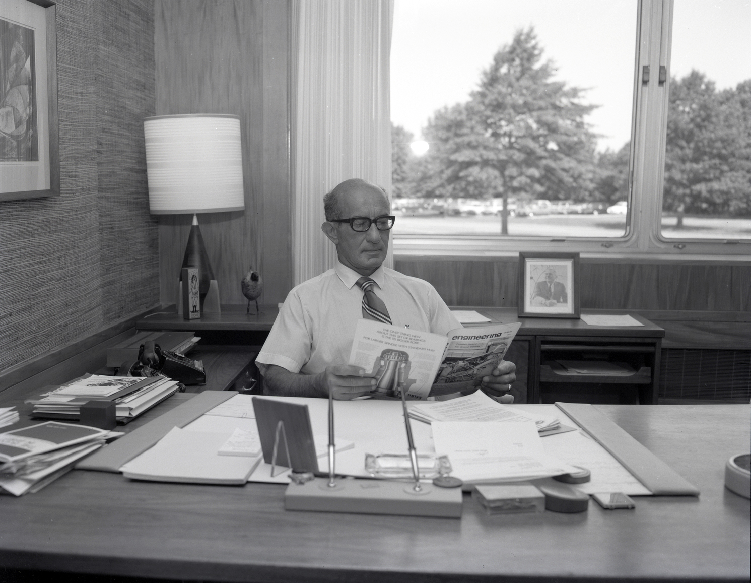 Man sitting at desk.
