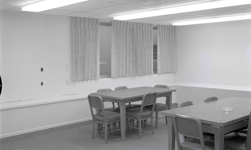 Room with two tables.