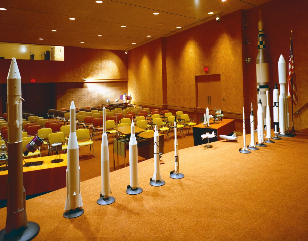 View from stage of auditorium with rocket models