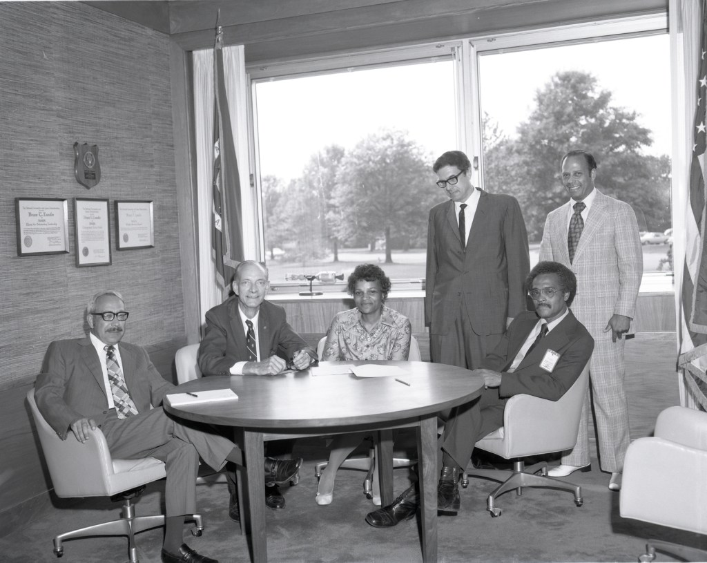 People sitting around round table.