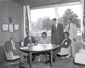 People sitting around round table.