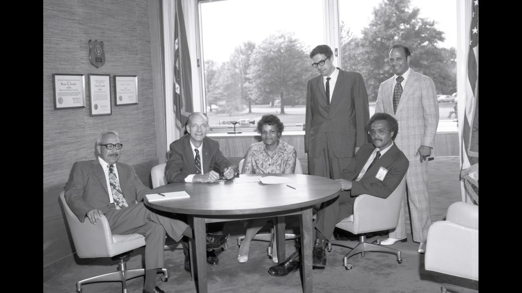 People sitting around round table.