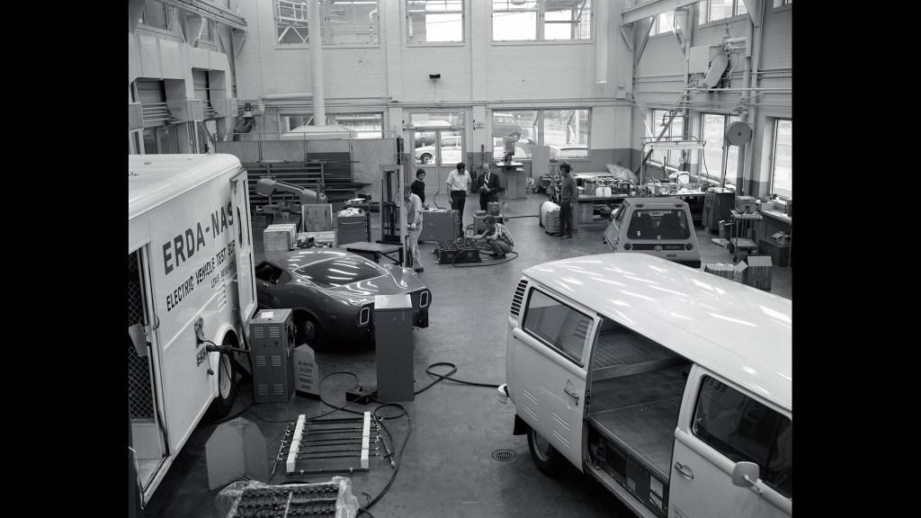 Shop area with various vehicles and equipment