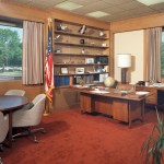 Office with desk and bookcase.