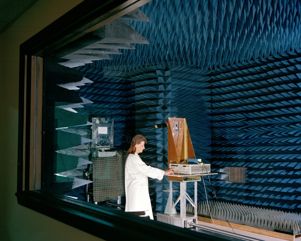 Researcher with equipment in lab