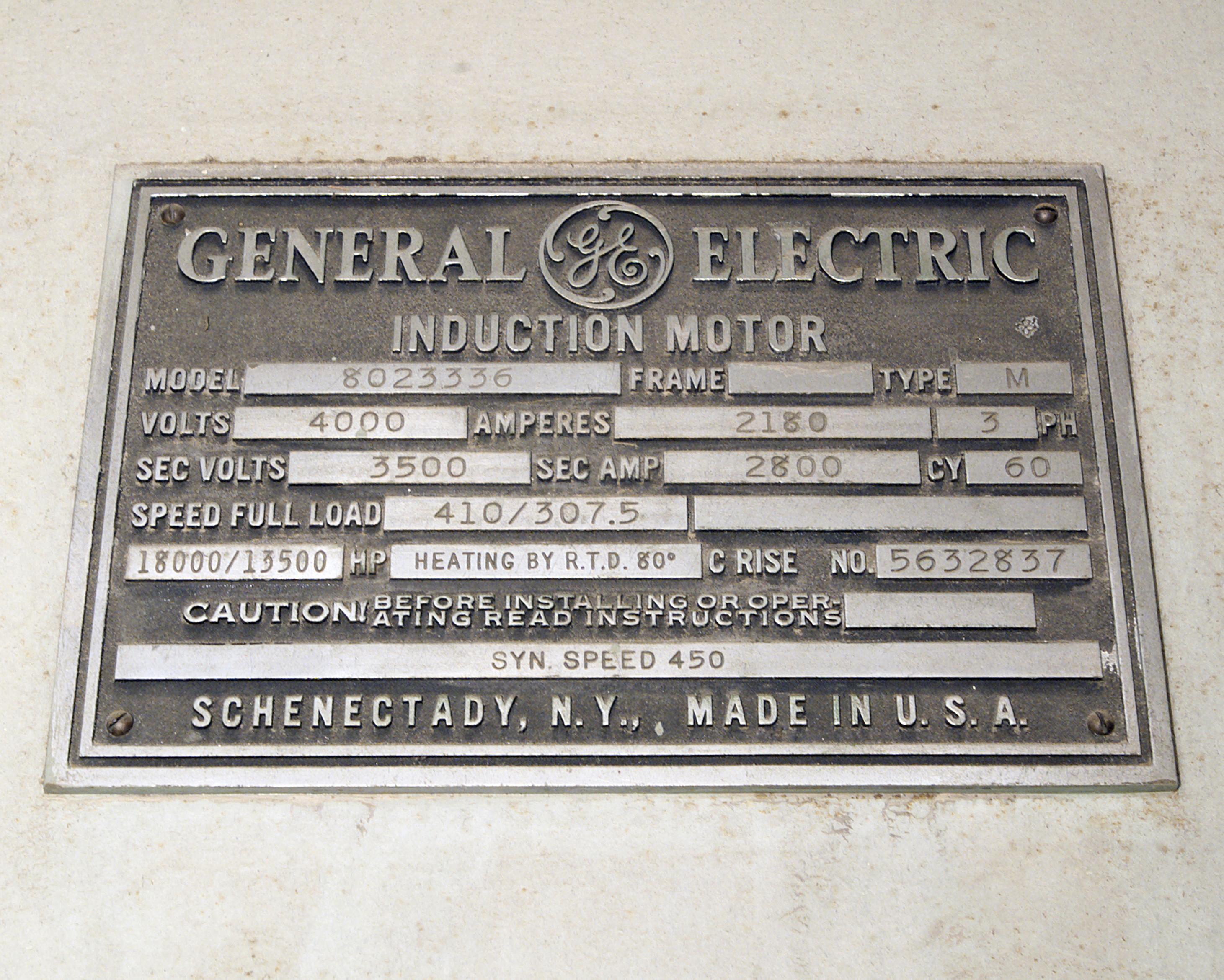 A close-up view of the face plate for the AWT's General Electric induction motor