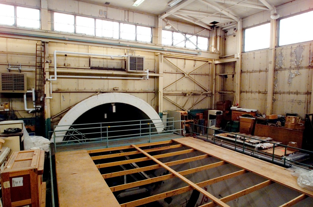 Elevated view of AWT test chamber crowded with equipment