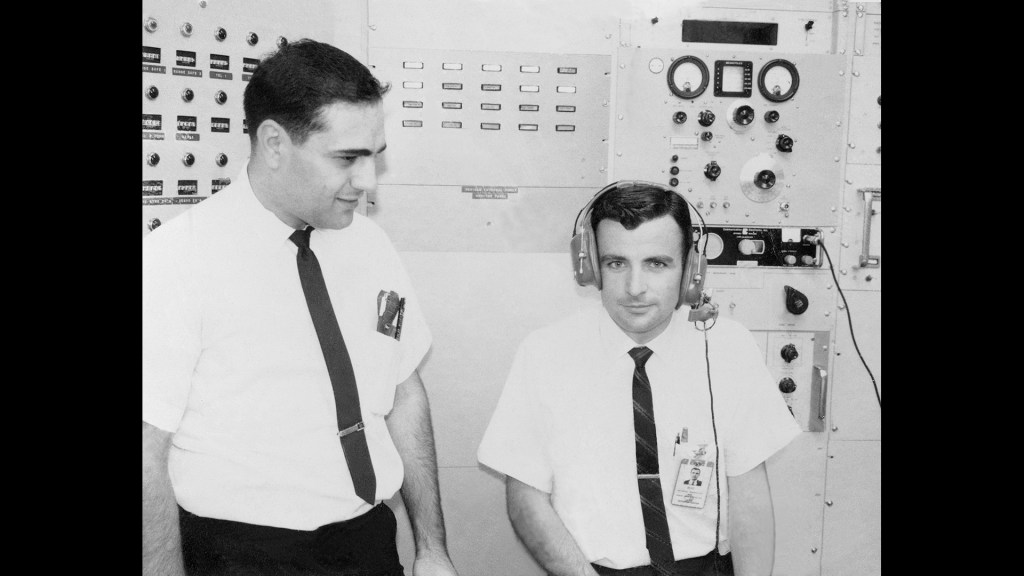 Two men in control room