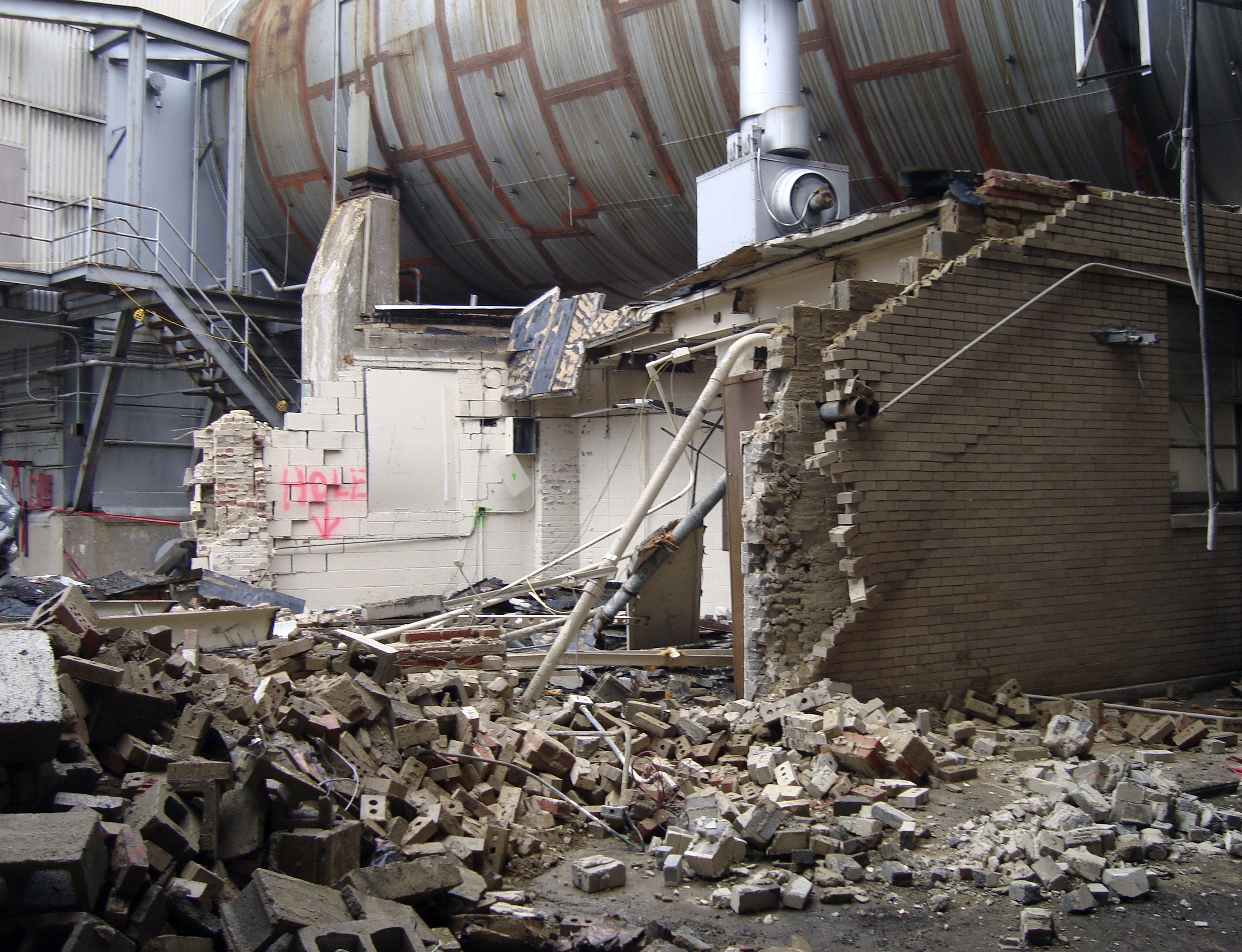 Half destroyed brick pump house