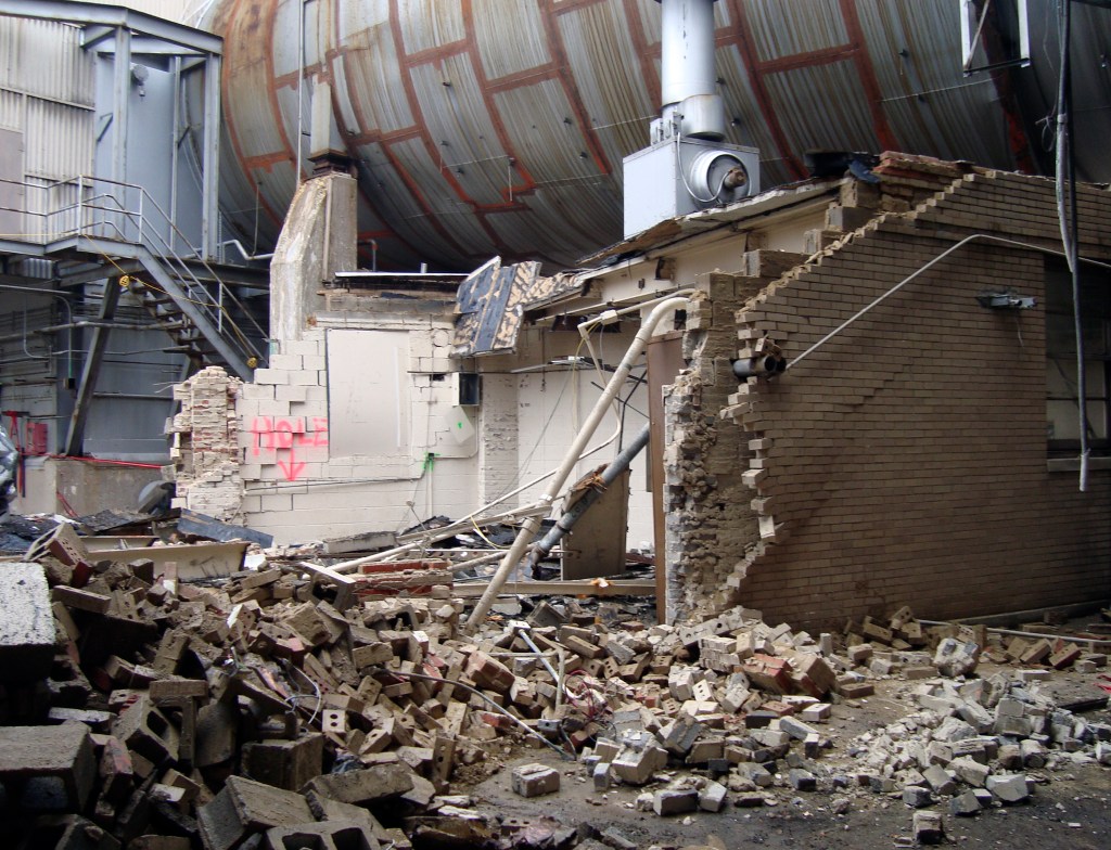 Half destroyed brick pump house