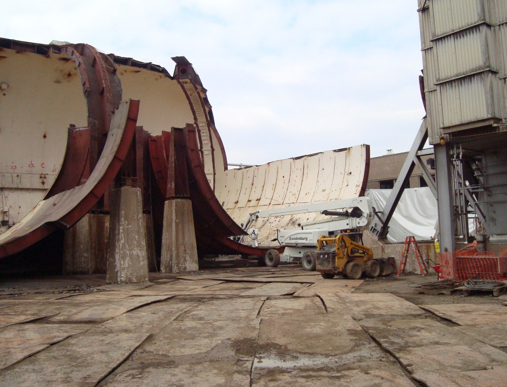AWT demolition site with steel plates on the ground