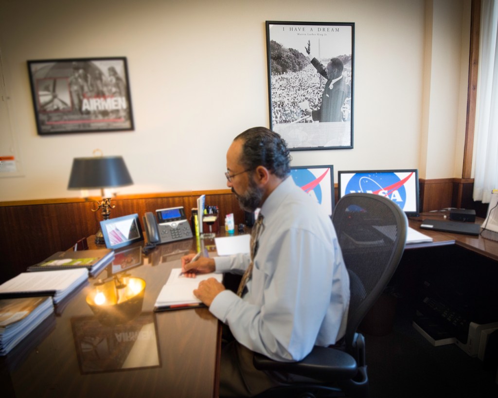 Man sitting at desk.