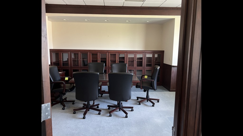 Empty office with meeting table.