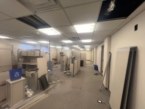 Large empty office with cubicles.