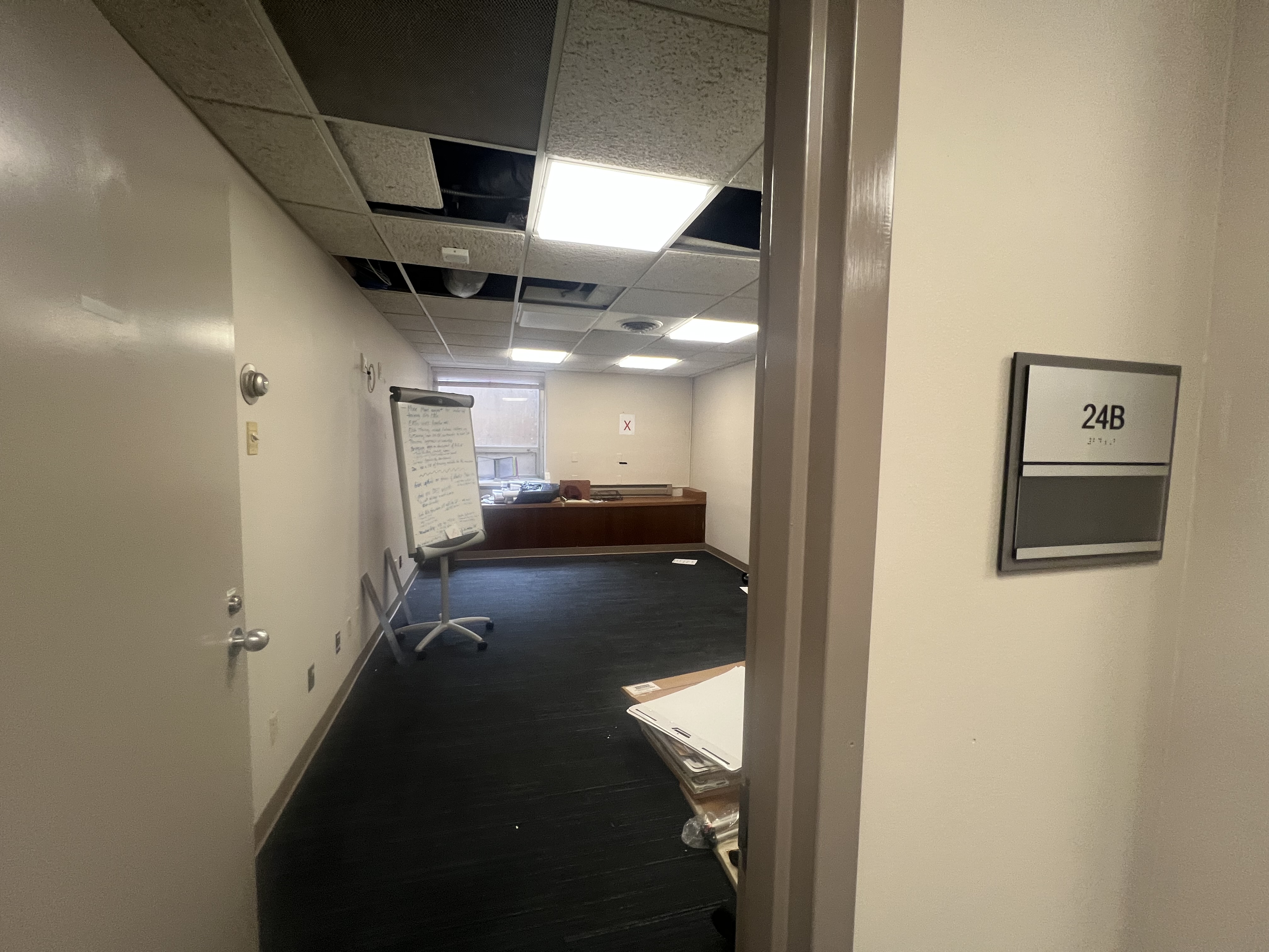 View through door into empty office.