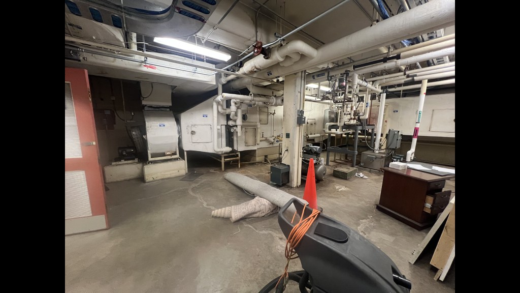 Mechanical equipment in room.