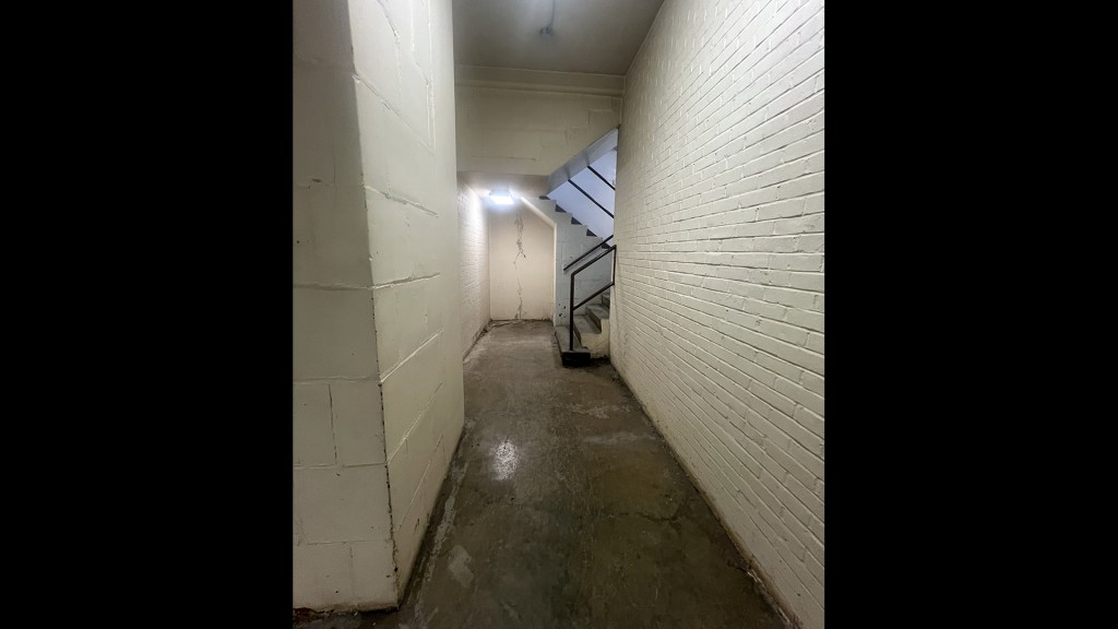 View through hallway of stairwell.