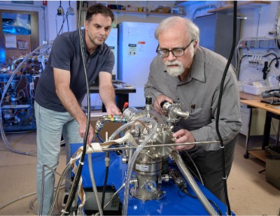 Image of scientists Michel Neuvo and Scott Sandford at NASA Ames Research Center's I3OLAB.