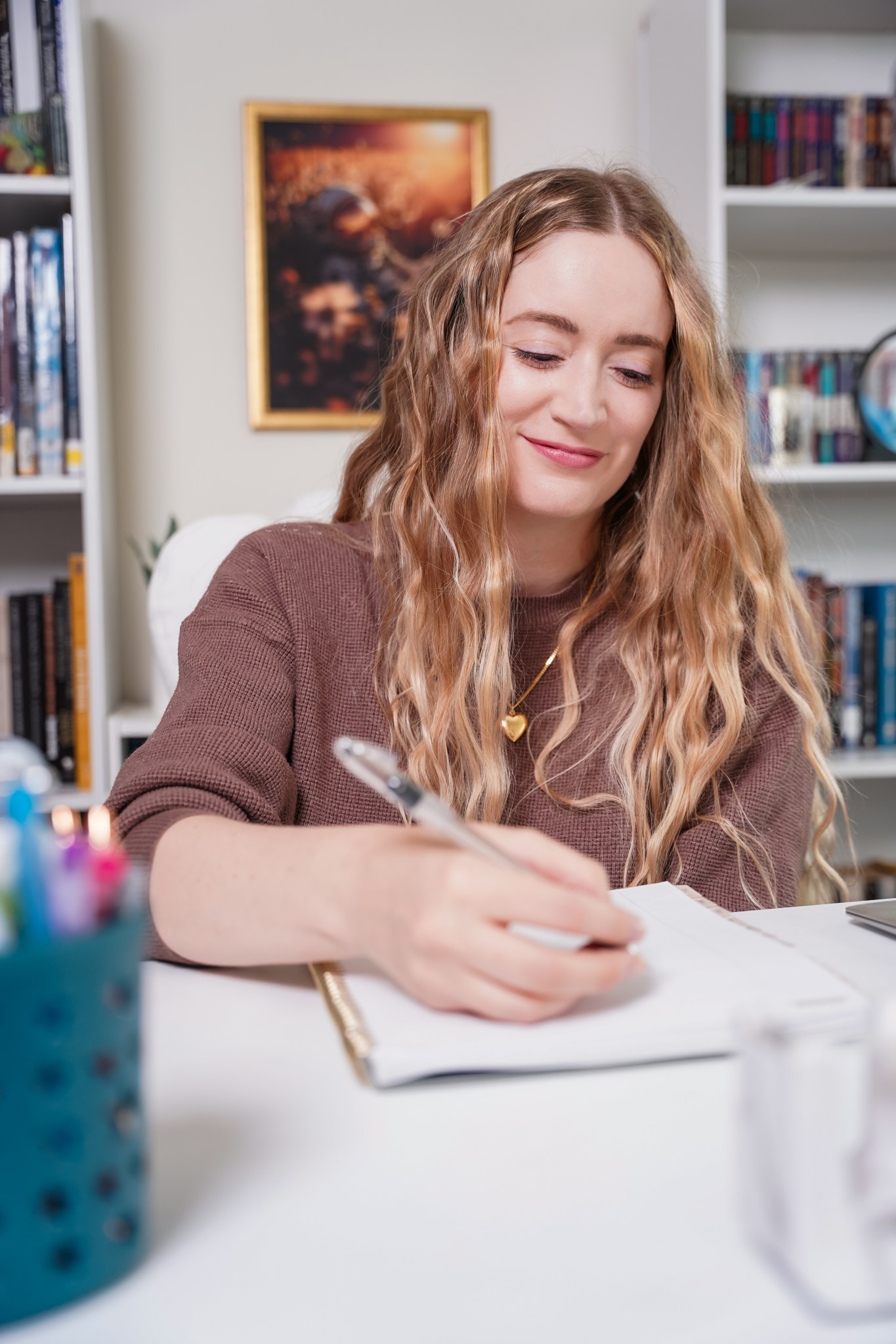 Photo of Ashley writing