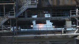 a space shuttle main engine is seen roaring during the final hot fire