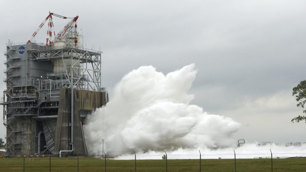 space shuttle flight engine No. 2061 sends vapor into the sky during test