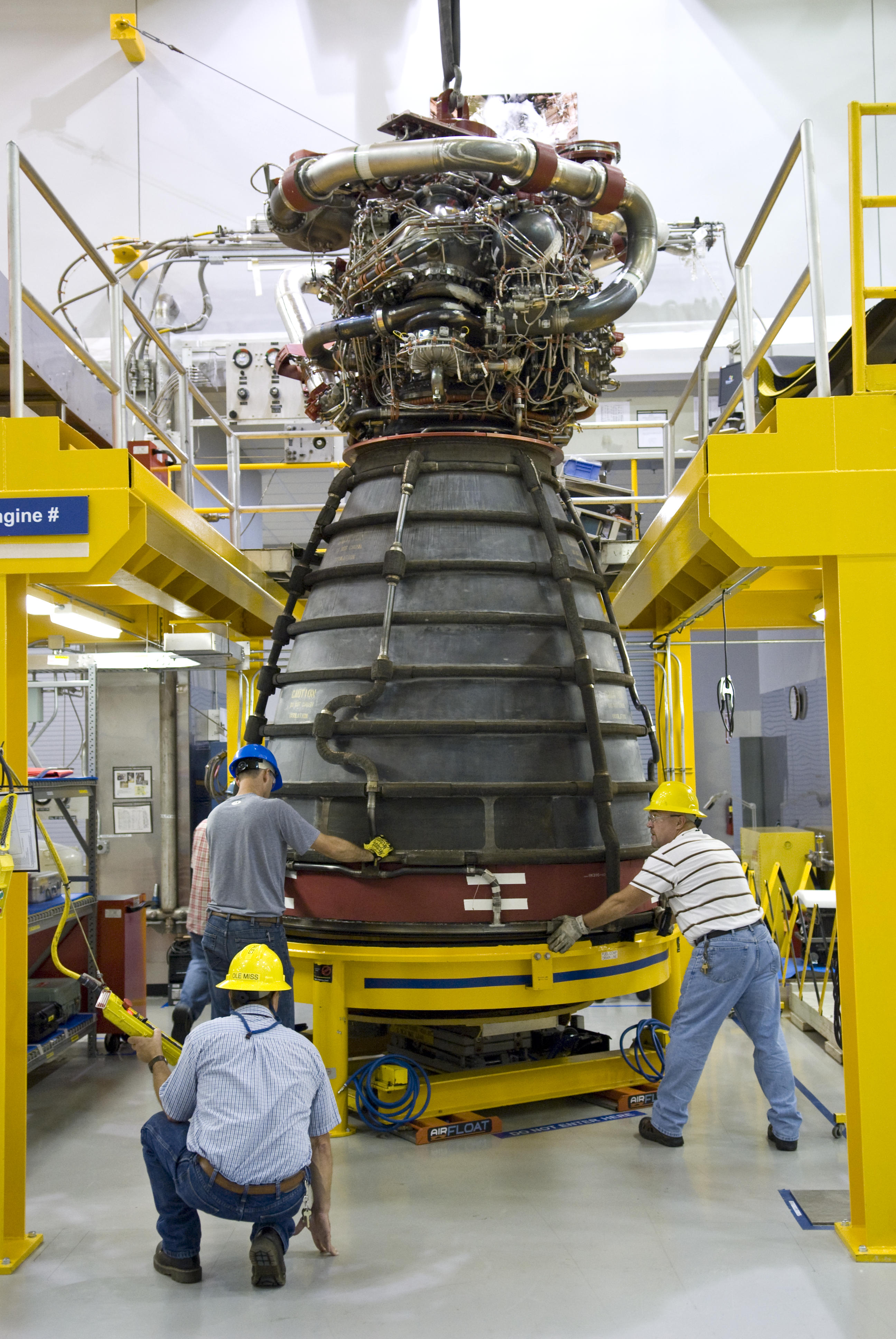 A work crew at the L3Harris Technologies Engine Assembly Facility processes Engine No. 0525