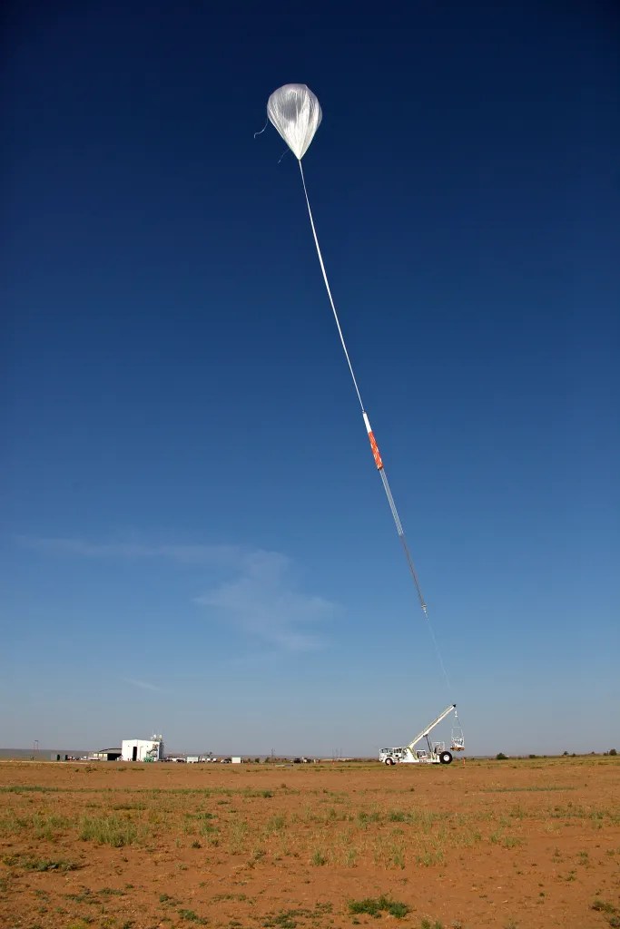 Balloon beginning to lift off in Fort Sumner New Mexico.