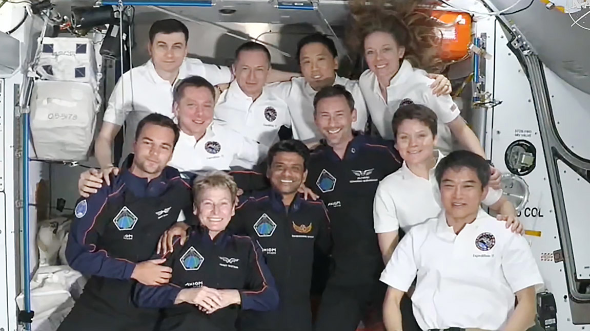 The four Axiom Mission 4 and seven Expedition 73 crew members join each other in the International Space Station's Harmony module for a group portrait.