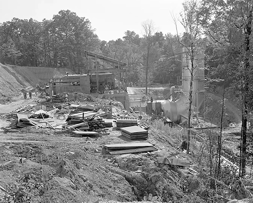 RETF construction site with supplies on ground.
