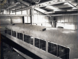 Railroad car inside building.