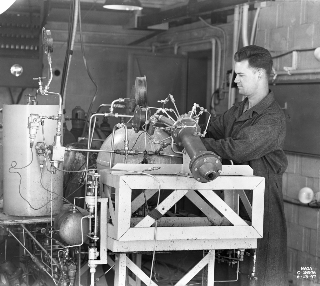 Man setting up small rocket test.