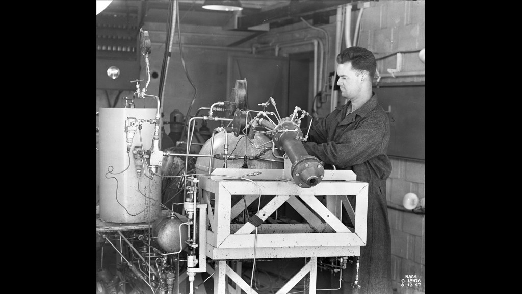 Man setting up small rocket test.