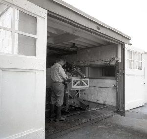Man working on test equipment.