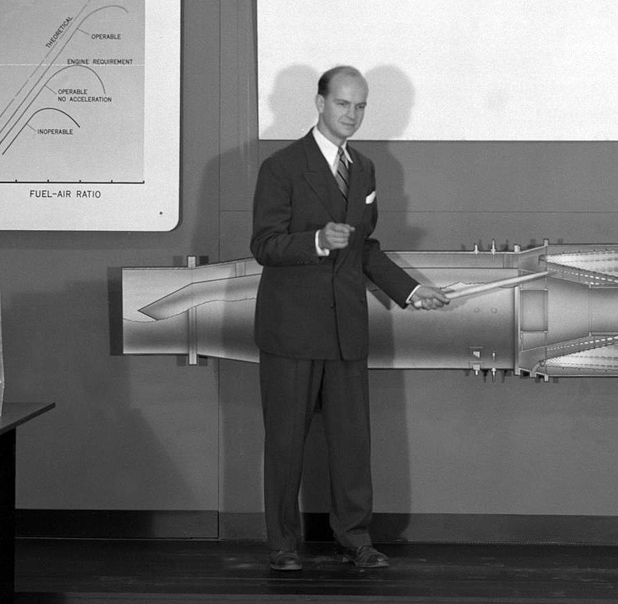 Man standing in front of combustion display.
