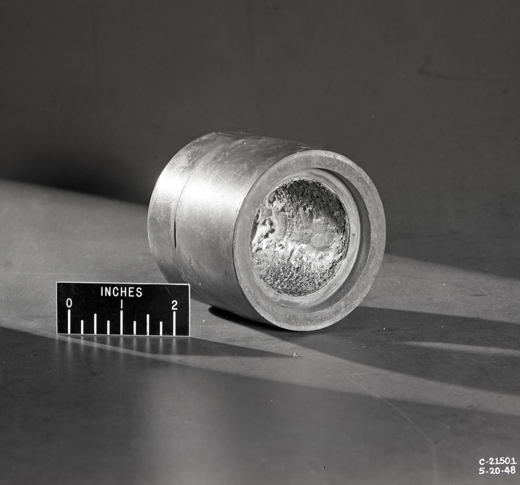 Small cylindrical component.