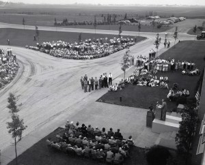 View from above of crowd gathered outside building.