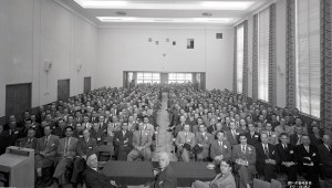 Group seated in auditorium.